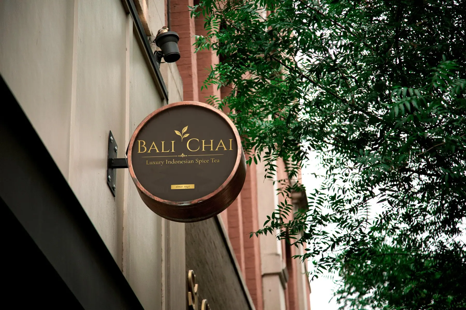 The round Bali Chai signboard on the front of a building